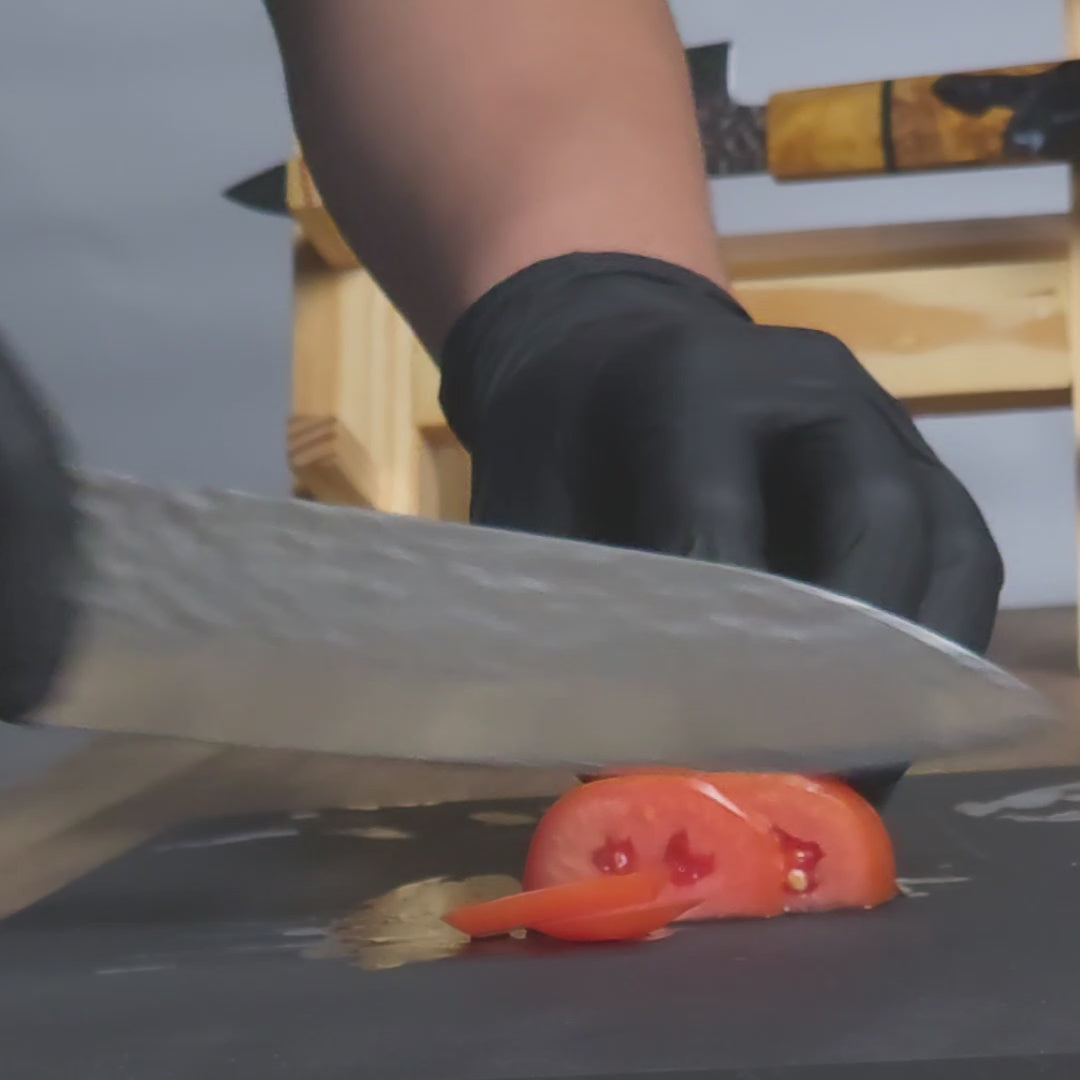 Aurora chef knife cutting