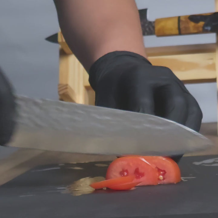 Aurora chef knife cutting