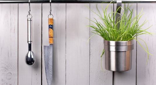 chef knife hanging on a rack 