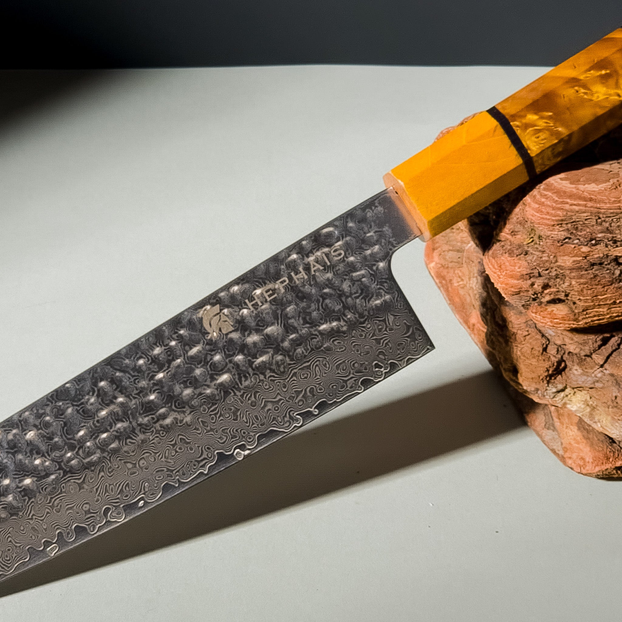 Close-up of Aurora Damascus Knife Handle and Blade Pattern