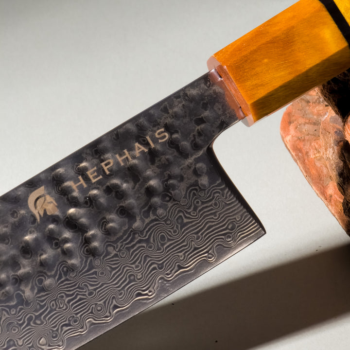 Close-up of Aurora Kiritsuke Knife Handle and Damascus Blade Design