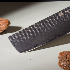 Close-up of Aurora Nakiri Knife Handle and Damascus Blade Design