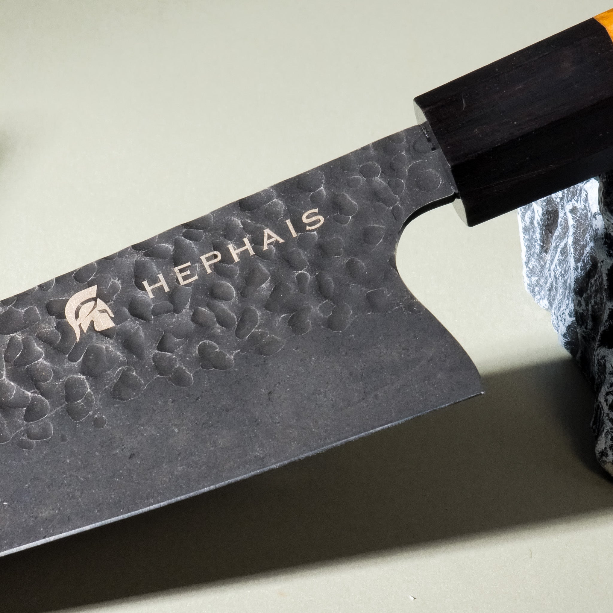 Close-up of Perseus Chef Knife Olive Wood Handle and Blade Design