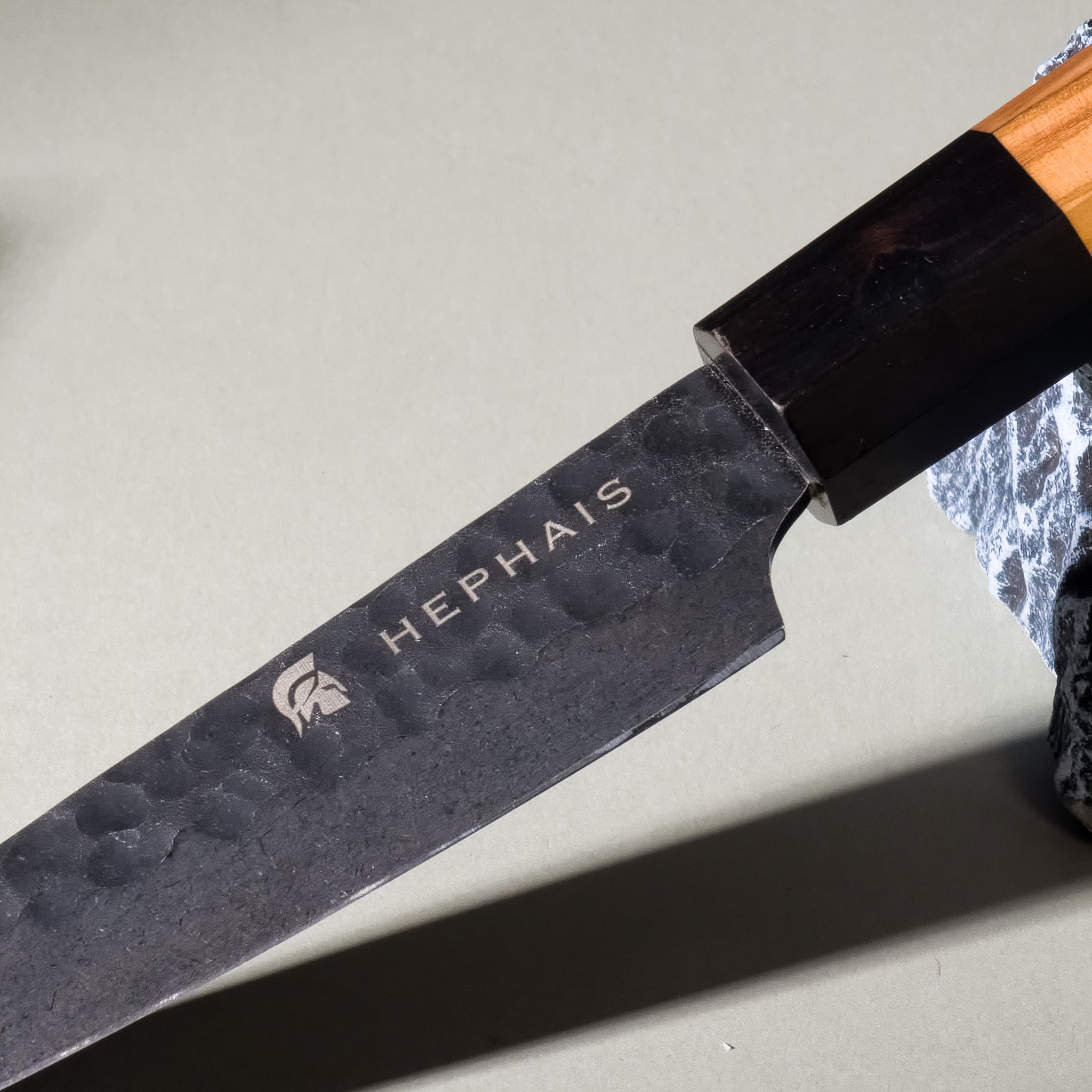 Close-up of Perseus Paring Knife Olive Wood Handle and Blade Design